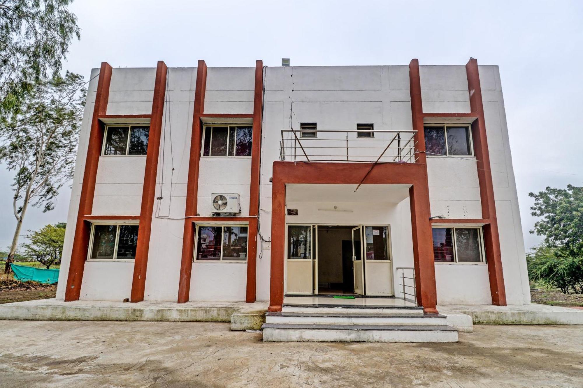 Super Hotel O Midway Treat Dhar Экстерьер фото